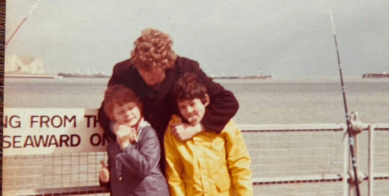 A younger Captain Simon fishing with his uncle and brother